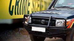 File image of a police vehicle at a crime scene