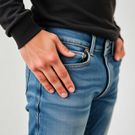 Here's the purpose of the tiny pocket in your jeans