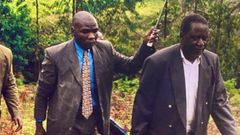 Raila Odinga and his late bodyguard George Oduor