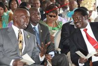 Raila Odinga and his late bodyguard George Oduor