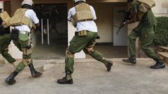 Kenyan security team advance to take on terrorists and rescue civilians in Dusit.