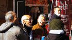 A group of elderly Japanese people in conversation