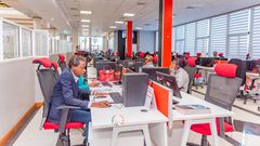 KRA staff working on their desks