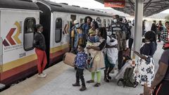 Passengers waiting to board a Kenya Railways train