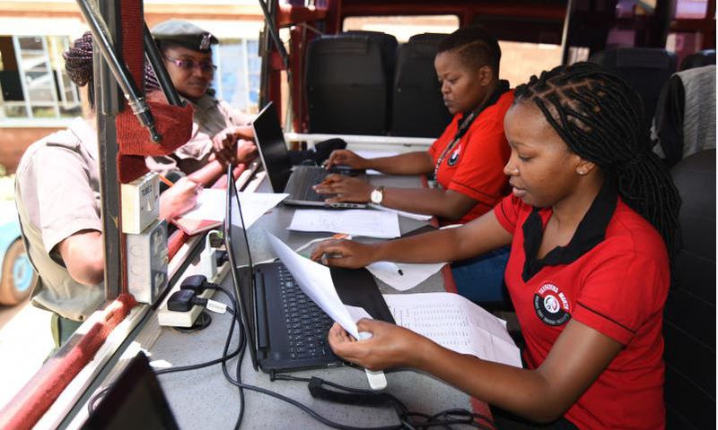 KRA staff working on their desks