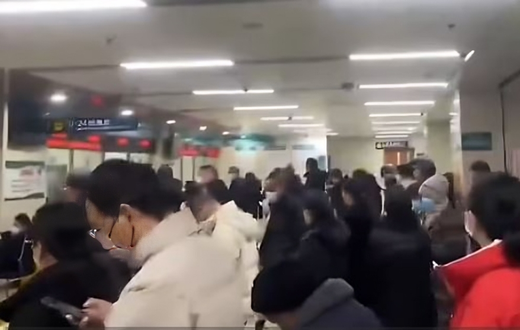 A screen-grab image of a video appearing to show an overcrowded medical facility