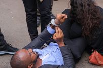 Boniface Mwangi being arrested