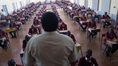 A teacher invigilating an exam