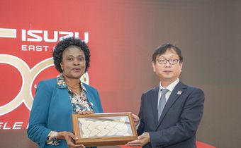 Koji Nakamura, Senior Executive Officer, International Sales Division, Isuzu Motors, gifts Isuzu EA Chair of the Board and Managing Director Rita Kavashe during the Isuzu EA 50th Anniversary celebrations