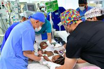 Doctors prepare conjoined Nigerian twins Hassana and Huseina for separation surgery at the King Abdullah Specialist Children's Hospital in Riyadh's King Abdulaziz Medical City