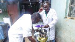 Mr Mutegi and his son Martin Mwenda