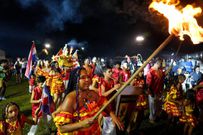 Members of the Paraguay-African cultural group Kamba Cua dance during celebrations in honor of Saint Balthazar, one of the Three Kings, on Epiphany in Fernando de la Mora, Paraguay, just after midnight Sunday, January 9, 2022.