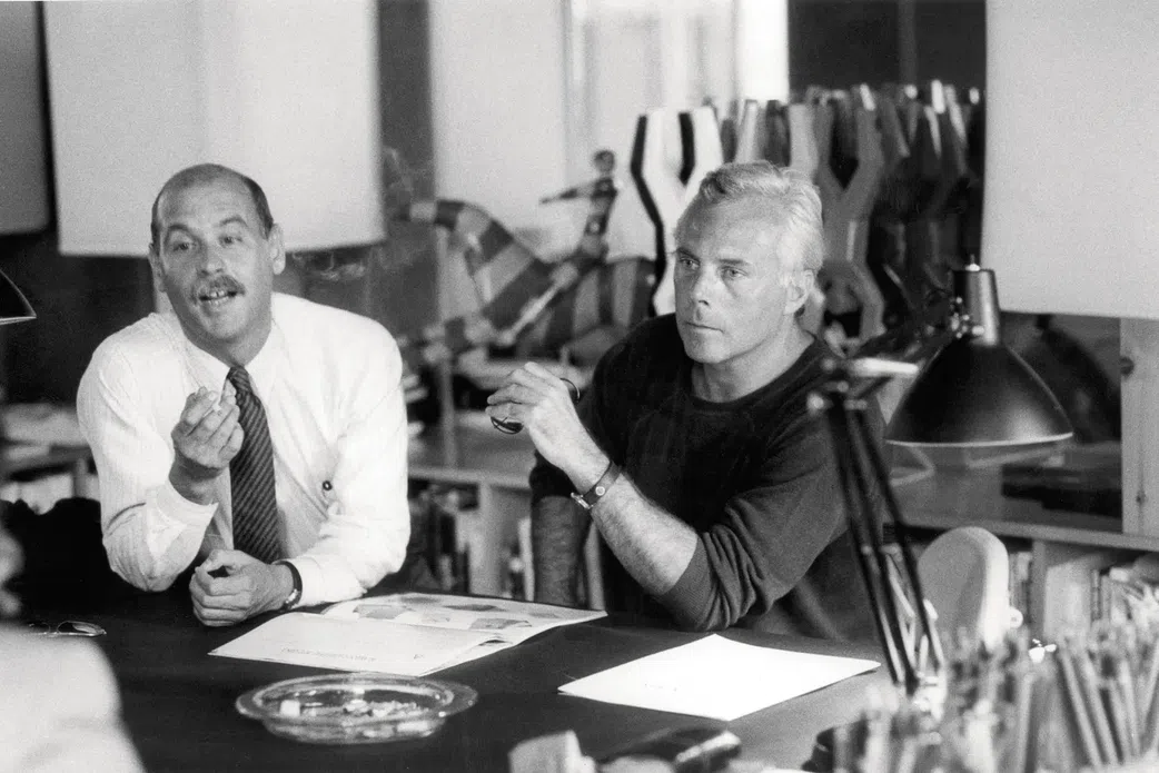 Giorgio Armani (right) and Armani Empire co-founder Sergio Galeotti