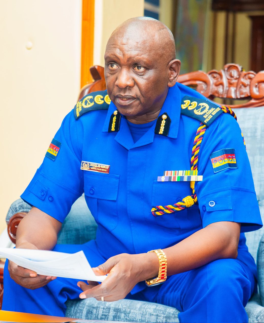 Inspector General Douglas Kanja Kirocho seated and reviewing documents. He has deployed NTSA, undercover officers, specialised units in countrywide crackdown