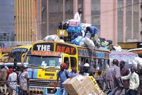 A bus loading passengers and luggage at Machakos bus station in Nairobi