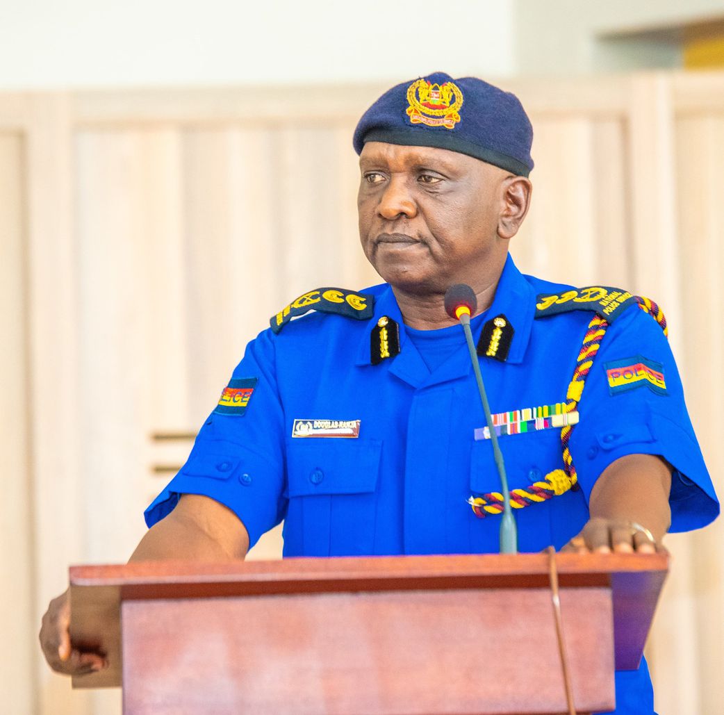 Inspector General Douglas Kanja Kirocho addressing a press briefing on road safety measures during the December 2024 festive season, wearing a National Police Service uniform. He has deloyed NTSA, undercover officers, specialised units