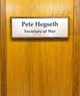 Secretary Pete Hegseth’s nameplate changed to Secretary of War after Trump rebranded Department of Defense to Department of War