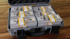 A briefcase with dollars