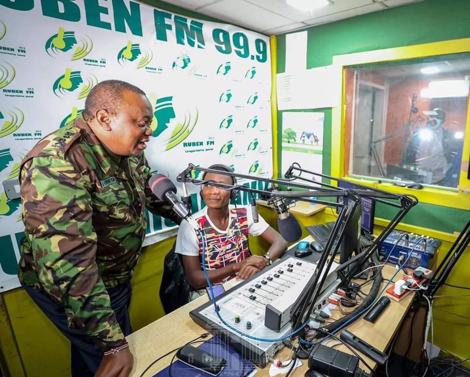 Radio presenter Shaffie Zele with Uhuru Kenyatta during an impromptu visit