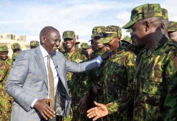 President William Ruto interacting with Kenyan police officers shortly after arriving in Port-au-Prince, Haiti on September 21, 2024.