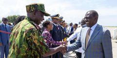 President William Ruto interacting with Kenyan police officers shortly after arriving in Port-au-Prince, Haiti on September 21, 2024.