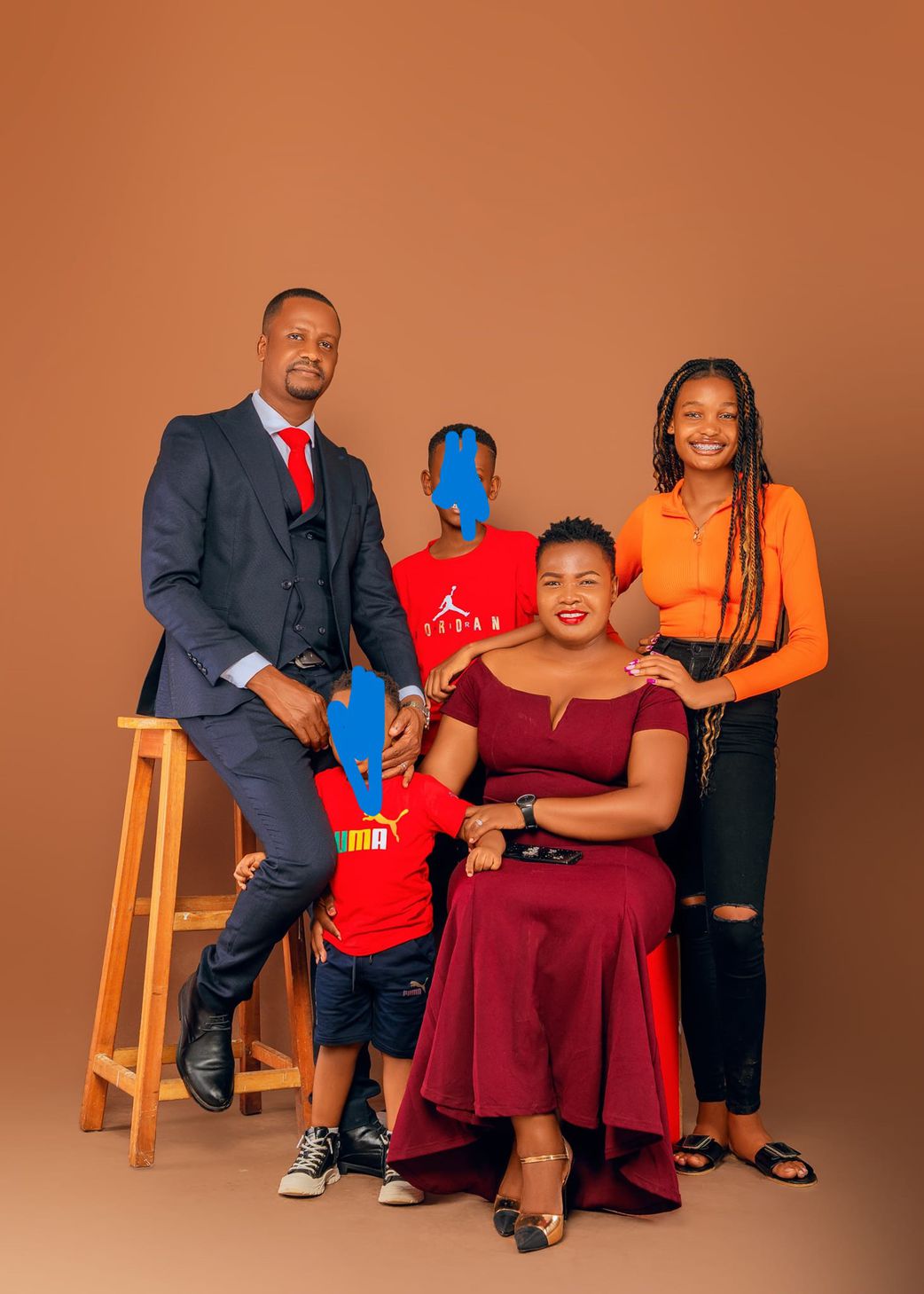 Veronicah Athiga with her husband and their children