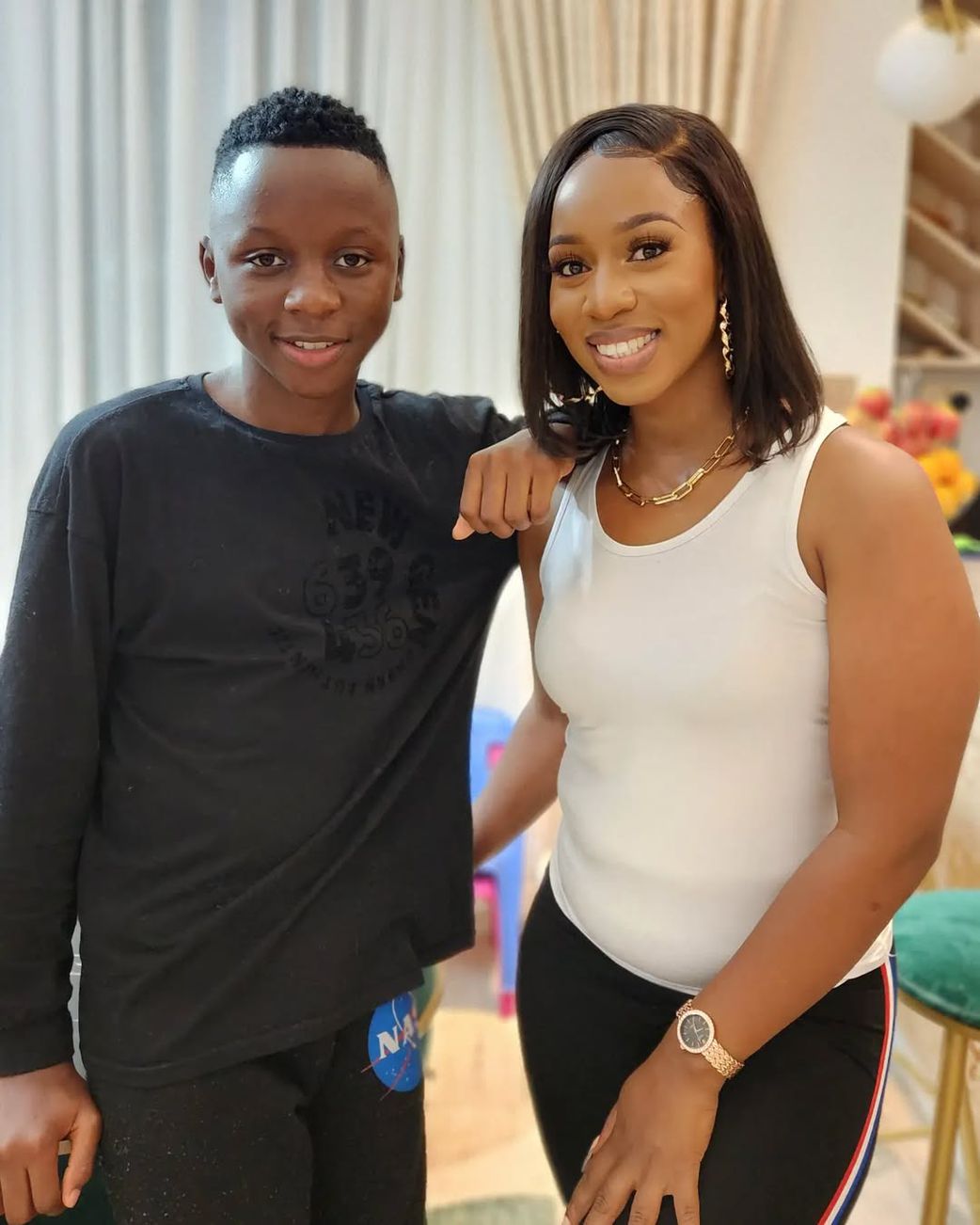 Morgan Bahati with his mother Diana Marua
