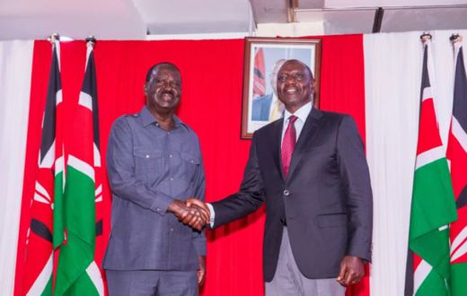 Former Prime Minister Raila Odinga shakes hands with President William Ruto after the two signed a cooperation agreement at KICC on March 7, 2025