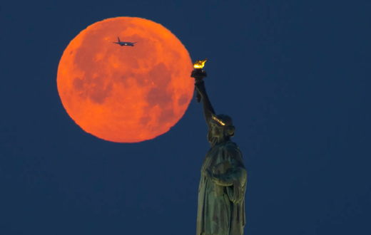 A file image of the full Strawberry Moon that was visible last year on June 4 gracing the sky as seen from New York (Courtesy)