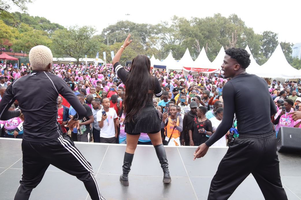 Azeezah hyping the crowd at the fun village in the Nairobi City Marathon