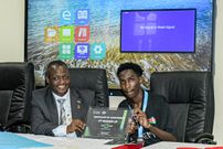 John Tingoi (right) with Chuka University Vice-Chancellor Prof. Henry Mutembei