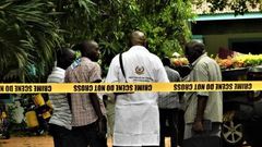 File image of DCI officers at a crime scene