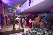 Ngartia performs a spoken word piece at the launch of the UK/Kenya Season 2025