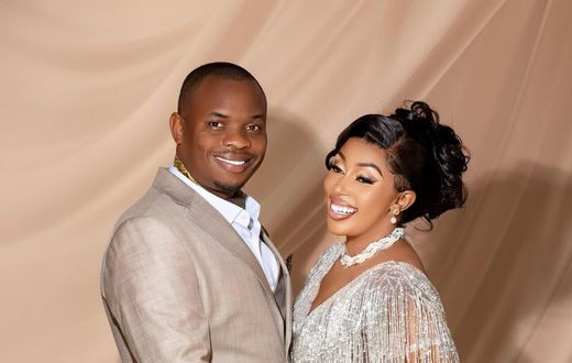 Kennedy Rapudo and his partner Amber Ray
