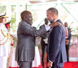President William Ruto confers the Chief of the Order of the Golden Heart on His Highness the Aga Khan V, Prince Rahim