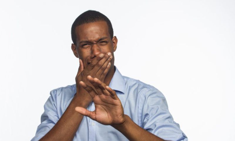 A person emiting bad breathe
