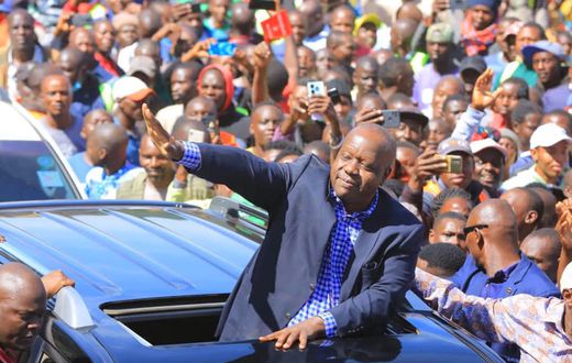 Former Interior Cabinet Secretary Fred Matiang’í acknowledges greetings from his supporters in Kisii town on May 2