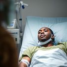 An AI-generated image of a man recovering in hospital for illustration purposes (Courtesy)