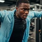 An AI-generated inage of a man working out wearing a light jacket