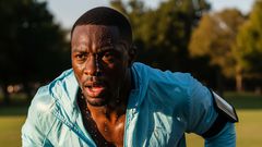 An AI-generated image of a man working out wearing a light-jacket