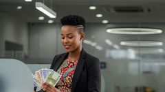 An AI-generated image of a lady holding banknotes