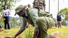 President William Ruto planting a tree