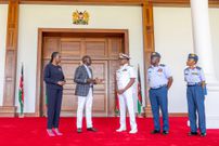 President William Ruto receives a report on the helicopter crash that killed General Francis Ogolla from Defence Cabinet Secretary Soipan Tuya at State House, Nairobi.