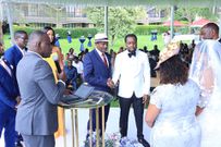 Kevin Muasya with his wife Sharon Nthoki on their wedding day