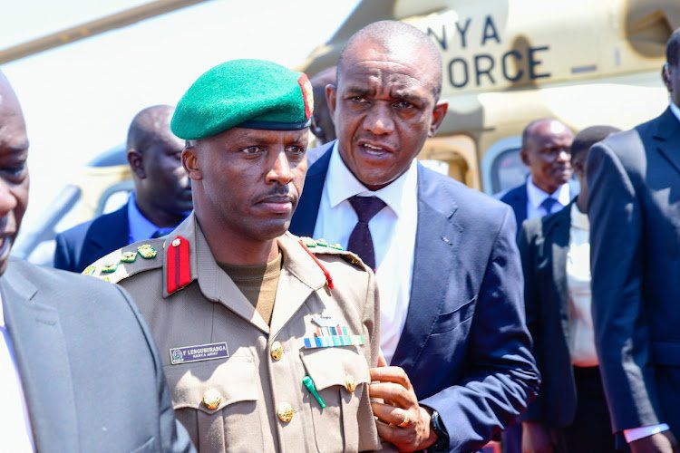 Former Aide-de-Camp Major General Timothy Stelu Lekolool with President William Ruto's new ADC Brigadier Fabian Lengusuranga