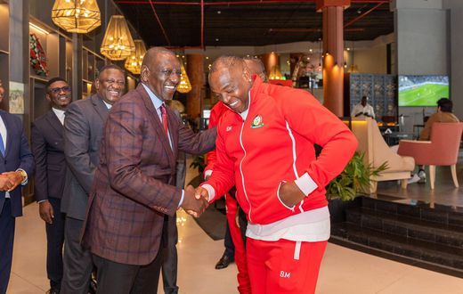 President William Ruto with Harambee Stars coach Benni McCarthy