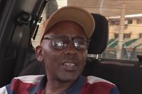 Patrick Muthami, an online taxi driver