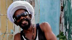 Jamaican Reggae star the late Born Calvin 'Cocoa Tea'