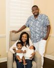 Susan Kihika with her husband Sam Mburu with their twin babies in the U.S.
