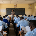 An AI-generated image of a teacher invigilating exams in a class in kenya
